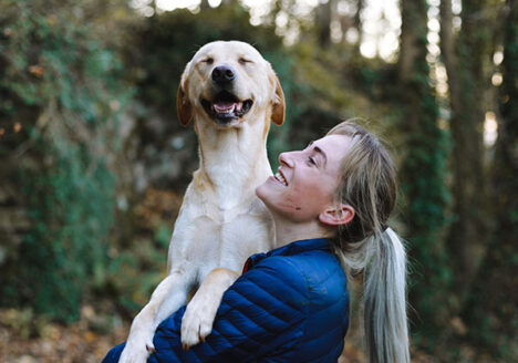 pet parent holding dog